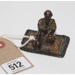 Cold painted bronze miniature of a Middle Eastern gentleman smoking a Hookah Pipe seated on a rug