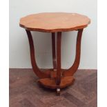 1930s oak occasional table with shaped top and under tier