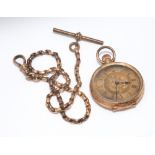 Ladies Swiss fob watch, case marked 14c, and a rose gold albert chain, link stamped 9ct.