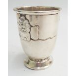 Danish silver christening mug with embossed decoration of a baby in bed marks to the base 3.