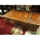 Large brown leather suitcase