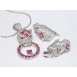 Cartier inspired ruby and silver panther necklace and a pair of matching pierced earrings
