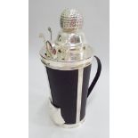 Novelty drinks container in the form of a golf caddy with silver plated cocktail shaker,