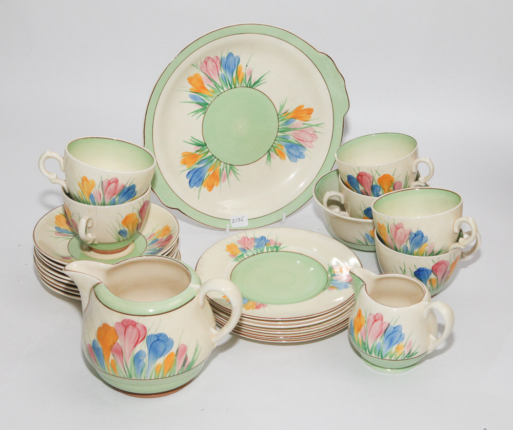1930's Clarice Cliff tea service, hand painted Crocus design comprising 24 pieces   Condition -