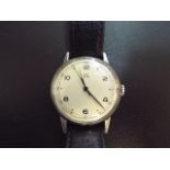 1940's Omega automatic wristwatch, with stainless steel back, with black leather strap and omega