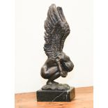 Contemporary bronze of a crouching angel on marble plinth