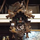 Black Forest style cuckoo clock with weights