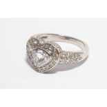 Heart shaped diamond ring, set with central trillion cut heart shaped diamond,