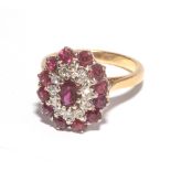 Large oval ruby and diamond cluster ring, on yellow gold shank stamped 18ct .