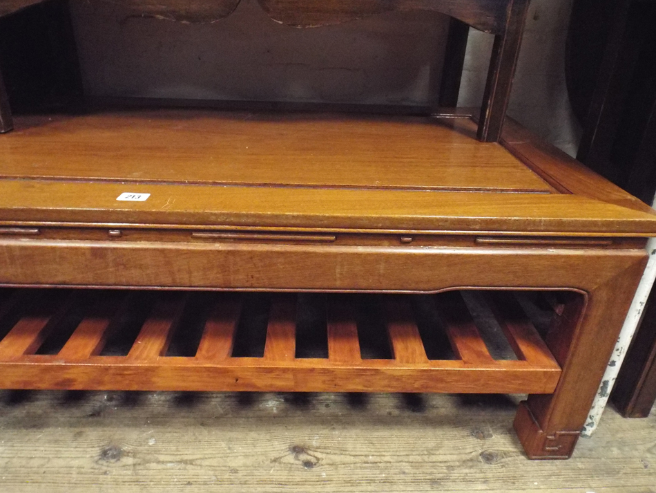 Long Chinese hardwood coffee table with under tier