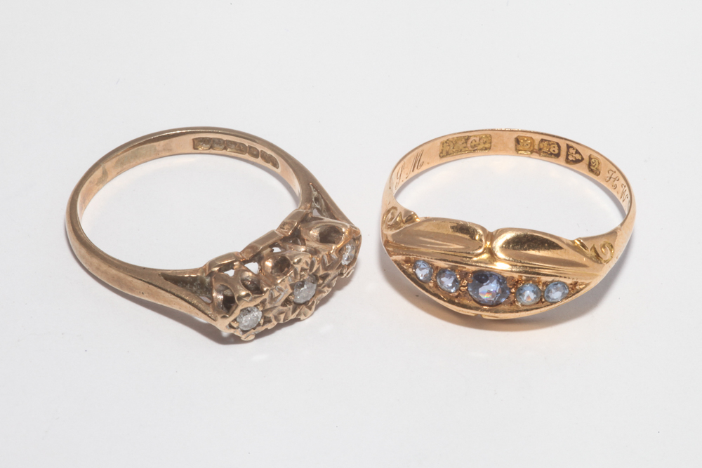 Victorian 18ct rose gold gypsy ring set with Ceylon sapphires and a three stone diamond ring,