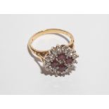 18ct yellow gold ruby and diamond cluster ring set with a square panel .