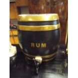 Vintage porcelain rum barrel fitted with a brass tap (50 cm high)