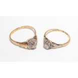 Two 18 ct gold diamond rings - one a single stone the other a cluster. 5.6g.
