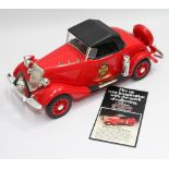 Jim Beam Bourbon porcelain spirit decanter modelled as a 1934 fire chief Ford V8 complete with