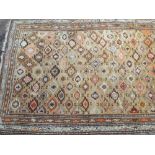 A patterned Shirvan rug (approx 9' x 4')