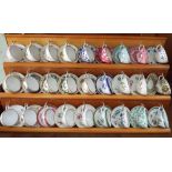 27 miniature bone china cup and saucer sets by Spode, Royal Adderley etc.