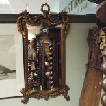 Late Georgian decorative gilt framed wall mirror