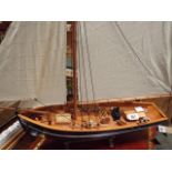 Model sailing boat on stand