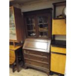 Small dark oak bureau/bookcase, fitted leaded glass doors to the top (A F)  As found