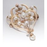 15ct Victorian pearl set brooch, set in art nouveau style with single pearl dropper, 3.5 cm's long.