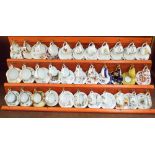 33 miniature bone china cup and saucer sets by Coalport, Royal Worcester, etc.