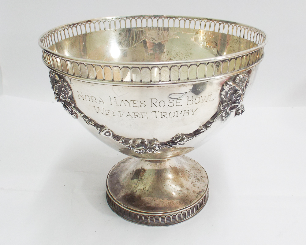Edwardian silver rose bowl with decorative pierced edge, Lion mask and ribbon bow decoration.