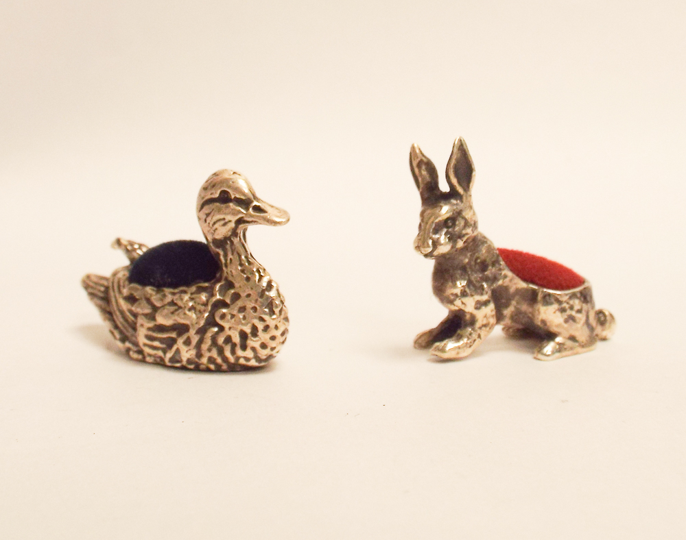 Miniature duck pin cushion and miniature rabbit pin cushions both stamped 925