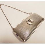 Early 20th century engine turned silver ladies evening purse with applied circular enamel panel