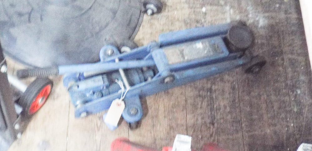 Small blue lightweight hydraulic trolley jack