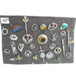 Collection of silver and white metal brooches, some set with stones, enamel etc.