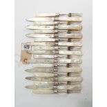 Goldsmiths & Silversmiths Company - silver and mother of pearl handled dessert knives and forks,