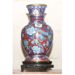 Floral decorated cloisonne vase with stand,