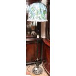 Tiffany style metal standard lamp with large bell shaped shade