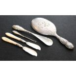 Silver backed cherub embossed hairbrush, shoehorn with silver handle,
