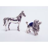 Miniature sterling silver model of a horse and a miniature poodle pin cushion,