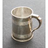 1920's silver tankard, of cylindrical ribbed form, Chester 1920, 7 oz troy. No inscription.