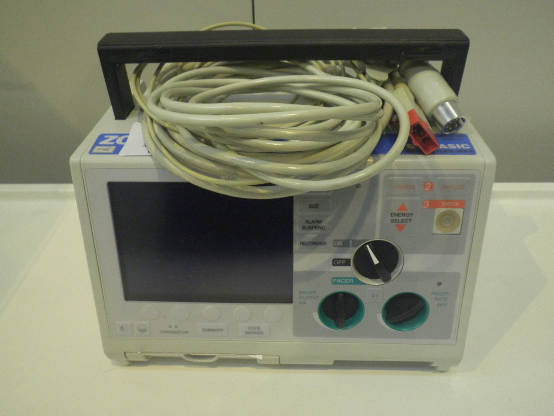 Zoll M Series Biphasic Defibrillator with Battery, ECG Lead and Paddle Lead. With Pacer Option *