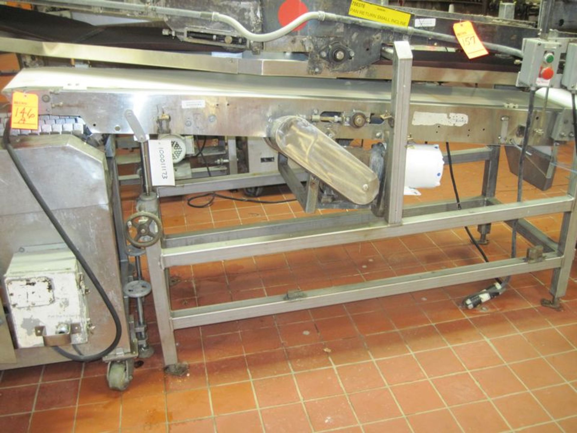 Rubber belt conveyor. Approximate 14" wide x 7' long belt. With approximate 1hp gear motor,