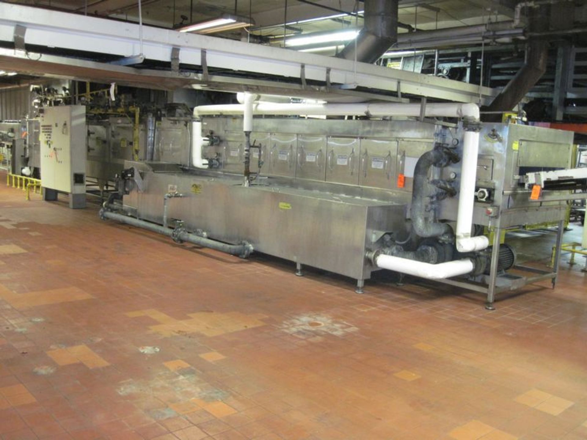 Alvey conveyorized pan washer. Approximate 44" wide x 48' long galvanized mesh belt. Stainless steel