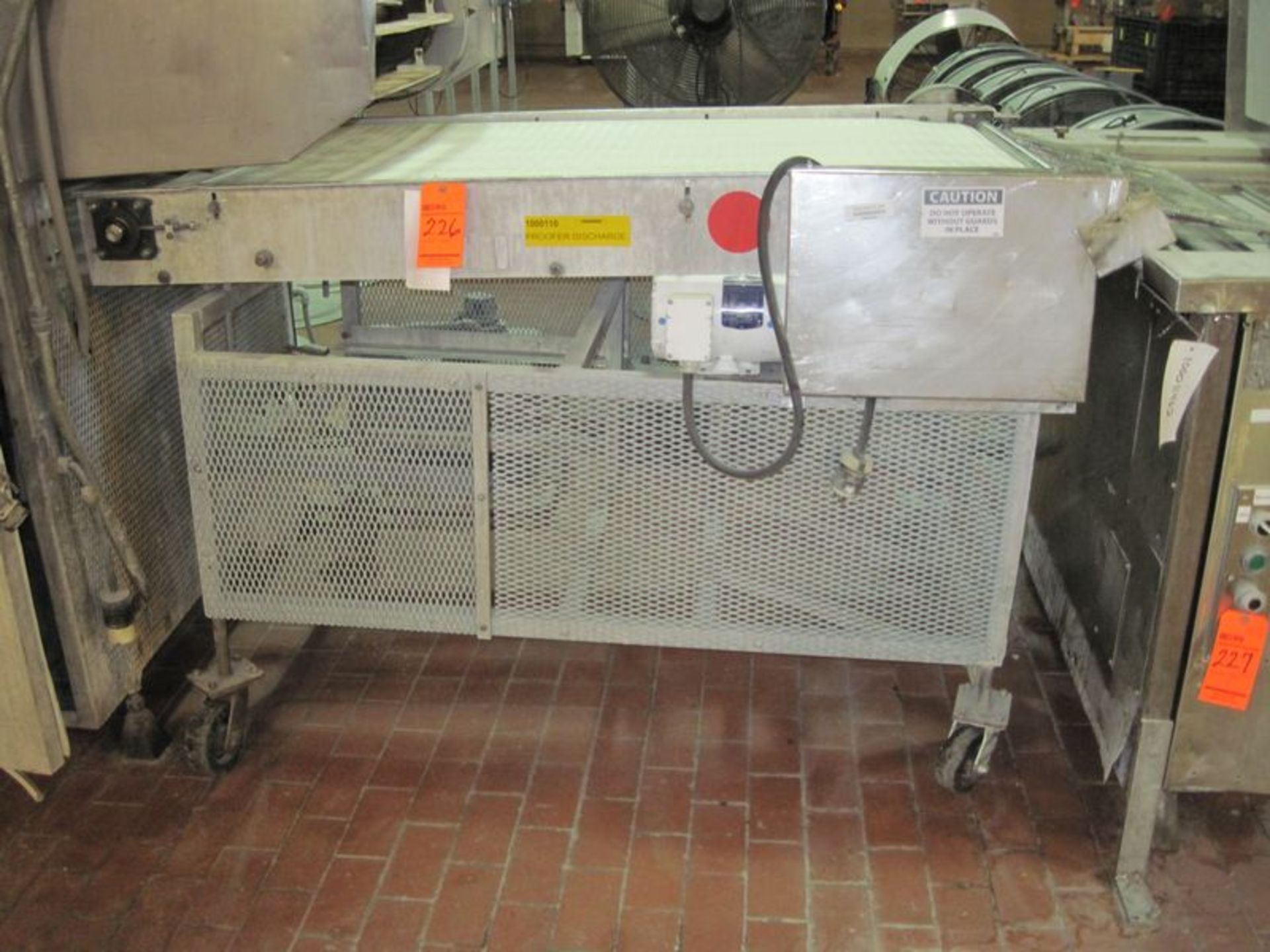 Plastic belt conveyor. Approximate 36" wide x 60" long. With approximate 1hp gear motor, stainless