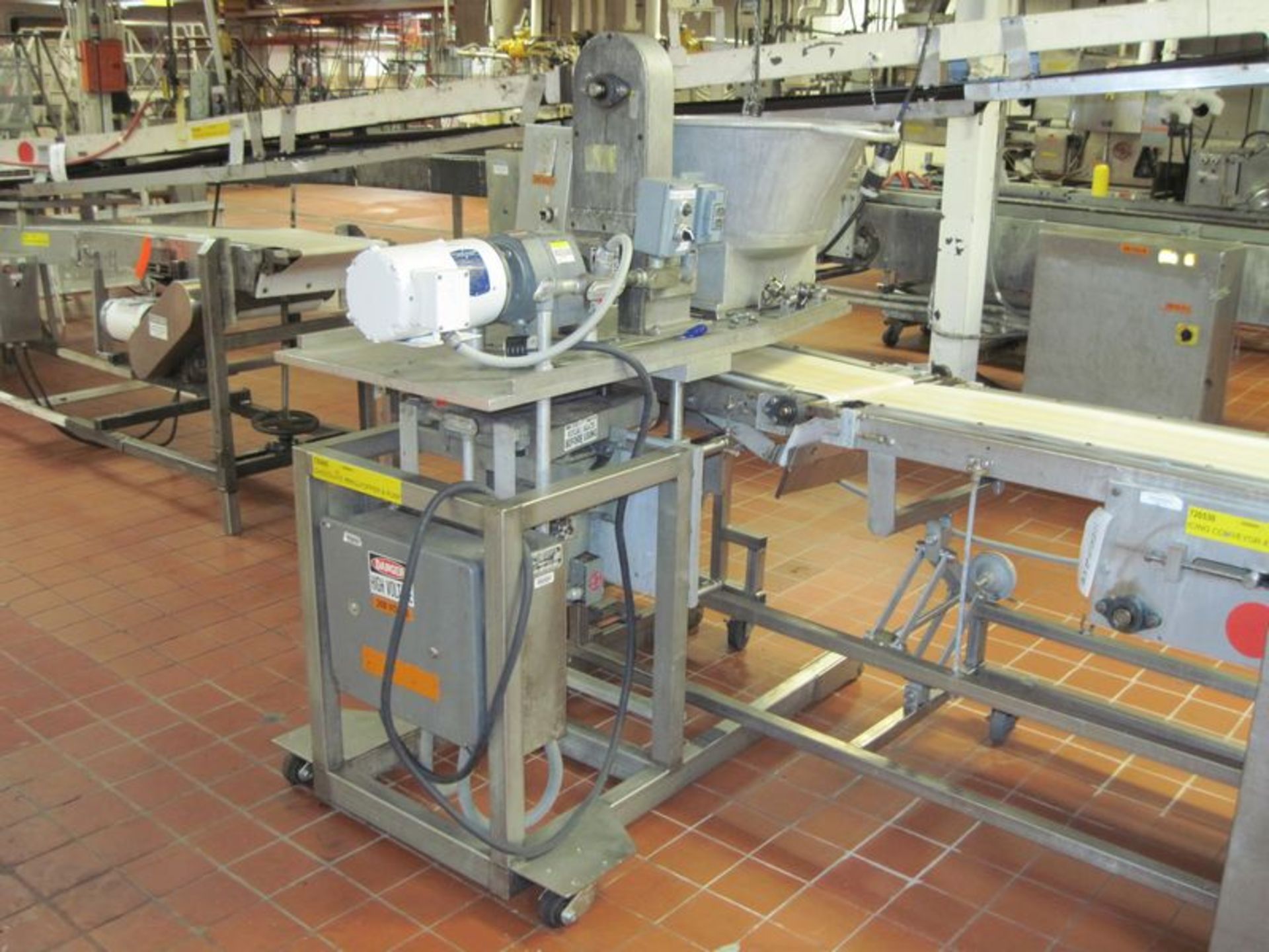 Doboy/Continental Baking single roll icing depositor. With approximate 2hp gear motor roll drive,