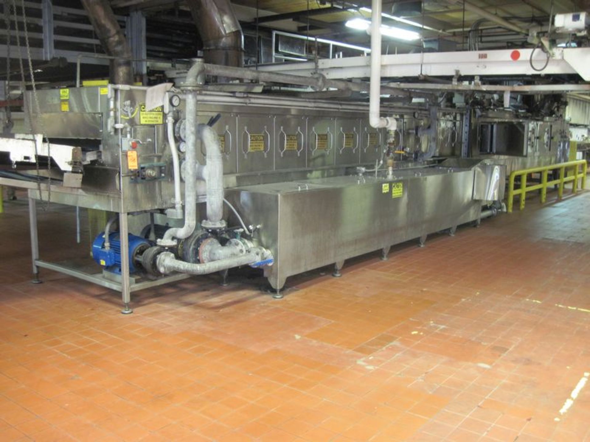 Alvey conveyorized pan washer. Approximate 44" wide x 48' long galvanized mesh belt. Stainless steel