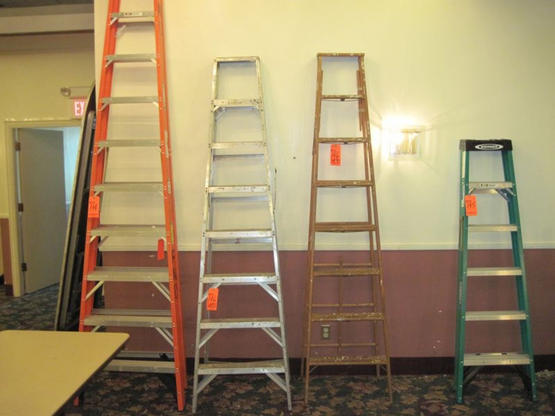 Lot (2) step ladders; (1) 8' aluminum and (1) 8' wood
