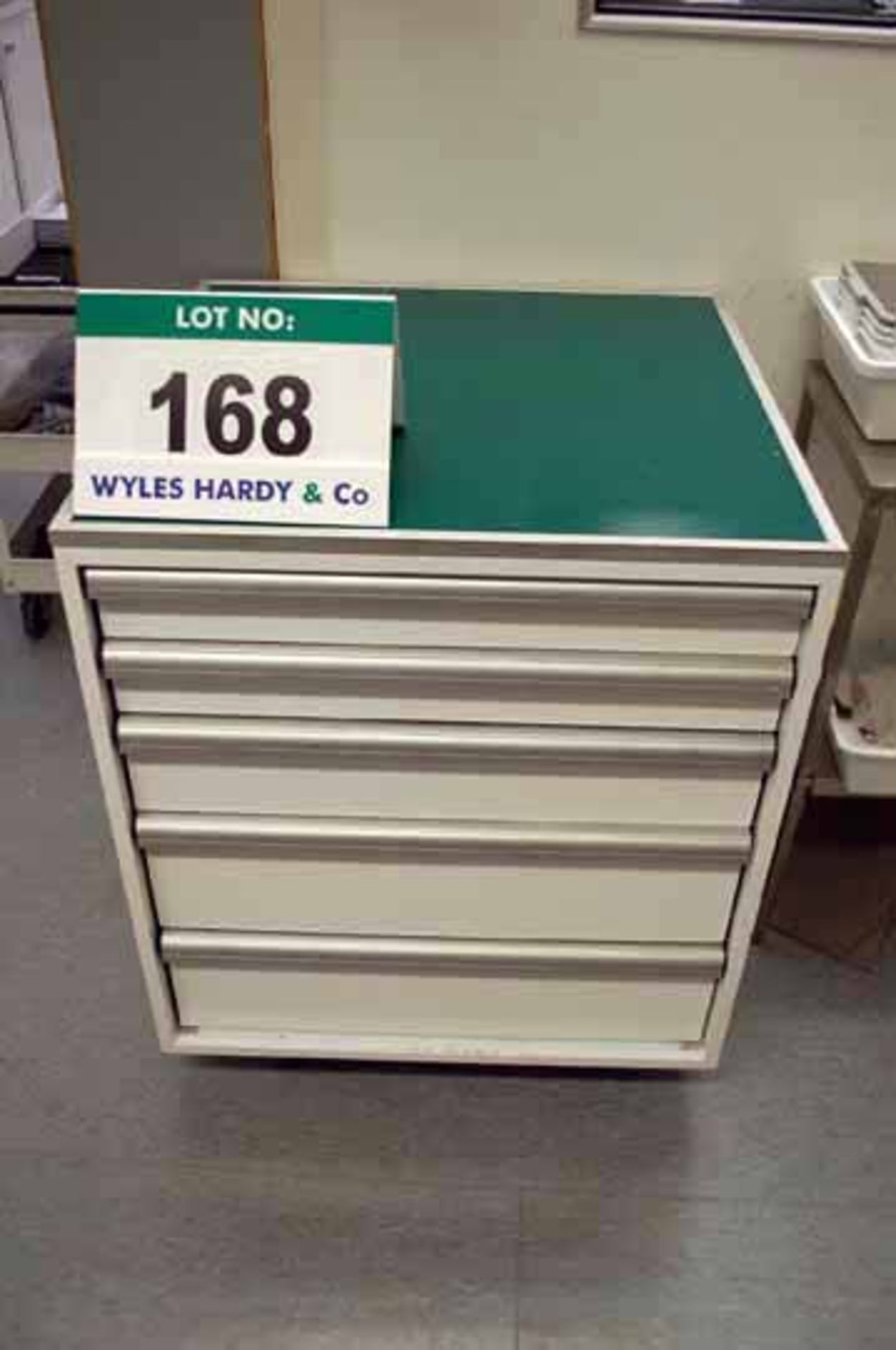 A White Steel, Green Laminate Topped 5-Drawer Mobile Cabinet