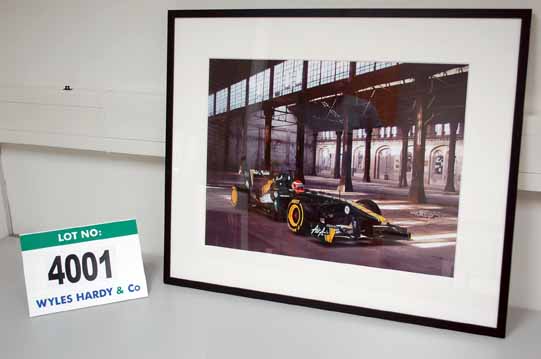 A 900mm x 700mm Framed & Glazed CGI Print of A 2011 TEAM LOTUS Car in Caterham 2012 Livery (Want