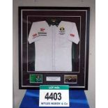 A Framed & Glazed LOTUS 2010 Team Shirt NOT Signed by Jarno Trulli (Sample Only) (Want it Shipped?