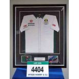 A Framed & Glazed LOTUS 2010 Team Shirt NOT Signed by Heikki Kovalainen (Sample Only) (Want it