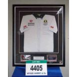 A Framed & Glazed LOTUS 2010 Team Shirt NOT Signed by Heikki Kovalainen (Sample Only) (Want it