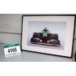 A 700mm x 900mm Framed & Glazed Print depicting A CATERHAM F1 Formula One Race Car (Want it Shipped?